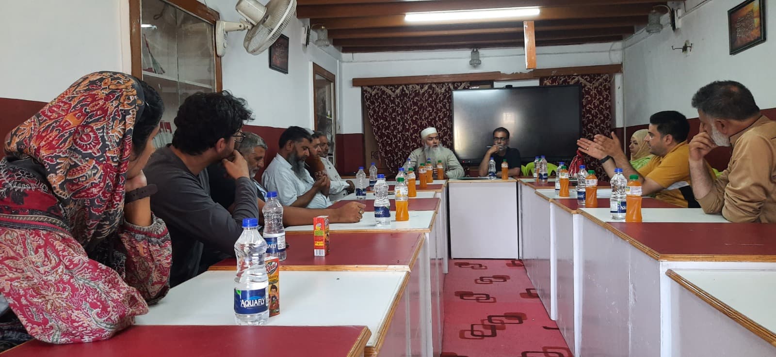 Community stakeholder meeting at a JKCS office